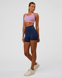 Woman wearing Stability High Support Sports Bra - Light Violet | Model:Charli | Size:XS (A-C Cup) | Thumbnail Index: 5