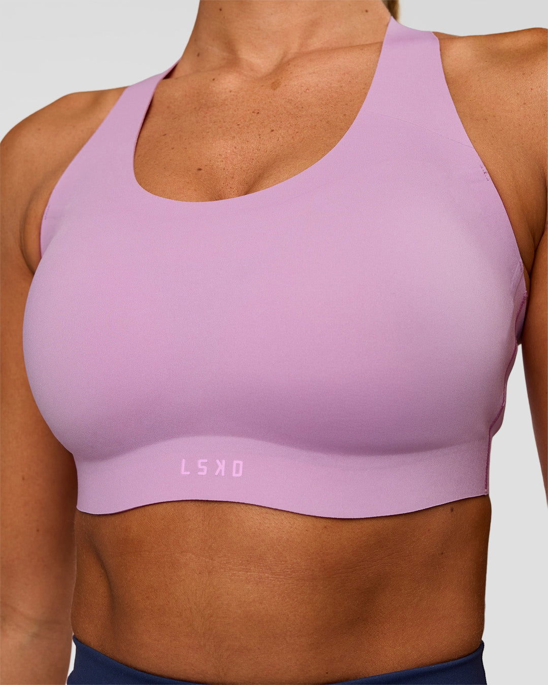 Woman wearing Stability High Support Sports Bra - Light Violet | Model:Charli | Size:XS (A-C Cup) - view 3