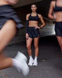 Woman wearing Accelerate 3" High-Rise Running Short - Black | Model:Steph | Size:XS