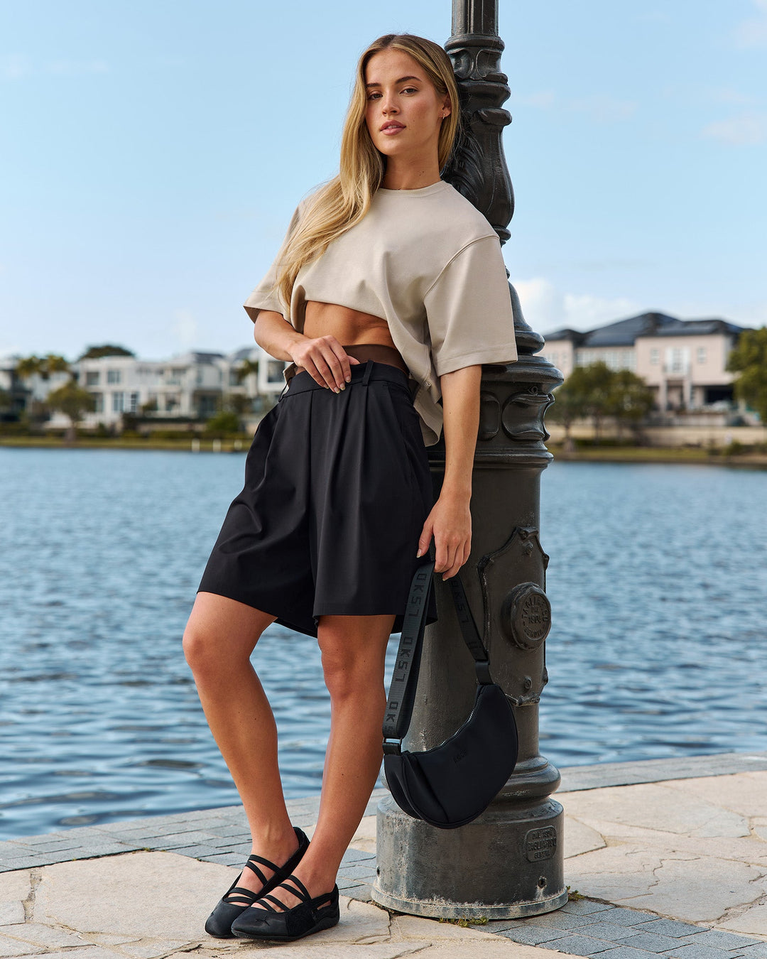 Woman wearing AfterDark ZeroCrease Cropped Tee - Shale Beige | Model:Issy | Size:XS