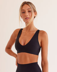 Woman wearing Bend & FLX Plunge Sports Bra - Black | Model:Georgia | Size:XS