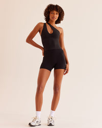 Woman wearing Bend & FLX Plunge Tank - Black | Model:Tomi | Size:XS