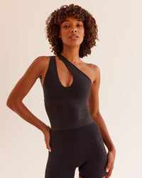 Woman wearing Bend & FLX Plunge Tank - Black | Model:Tomi | Size:XS