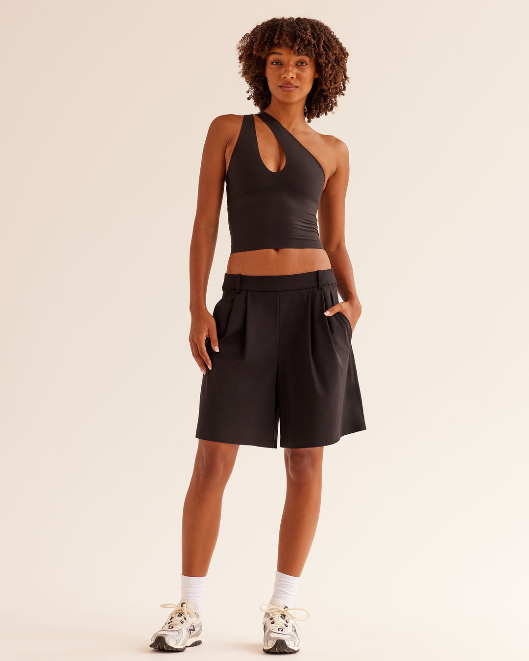 Woman wearing Bend &amp; FLX Plunge Tank - Black | Model:Tomi | Size:XS