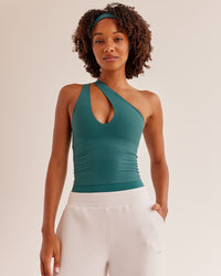 Woman wearing Bend & FLX Plunge Tank - Transformative Teal | Model:Tomi | Size:XS
