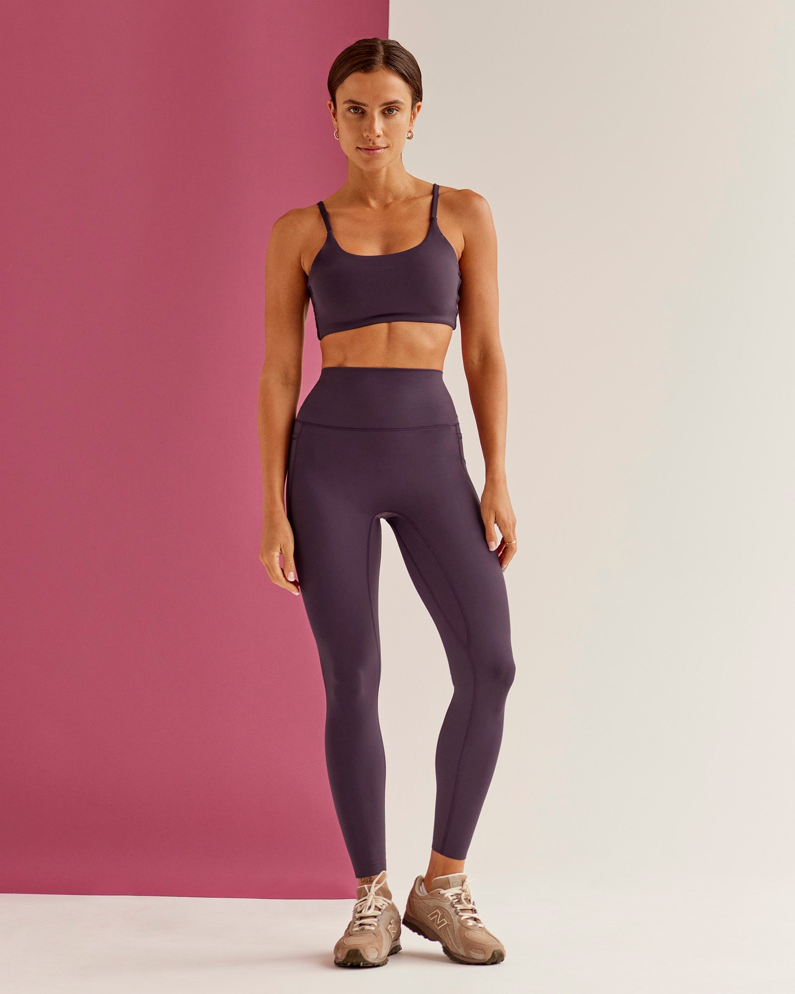 Woman wearing Elixir Ultra High-Rise Full Length Legging Pockets - Midnight Plum | Model:Bruna | Size:XS