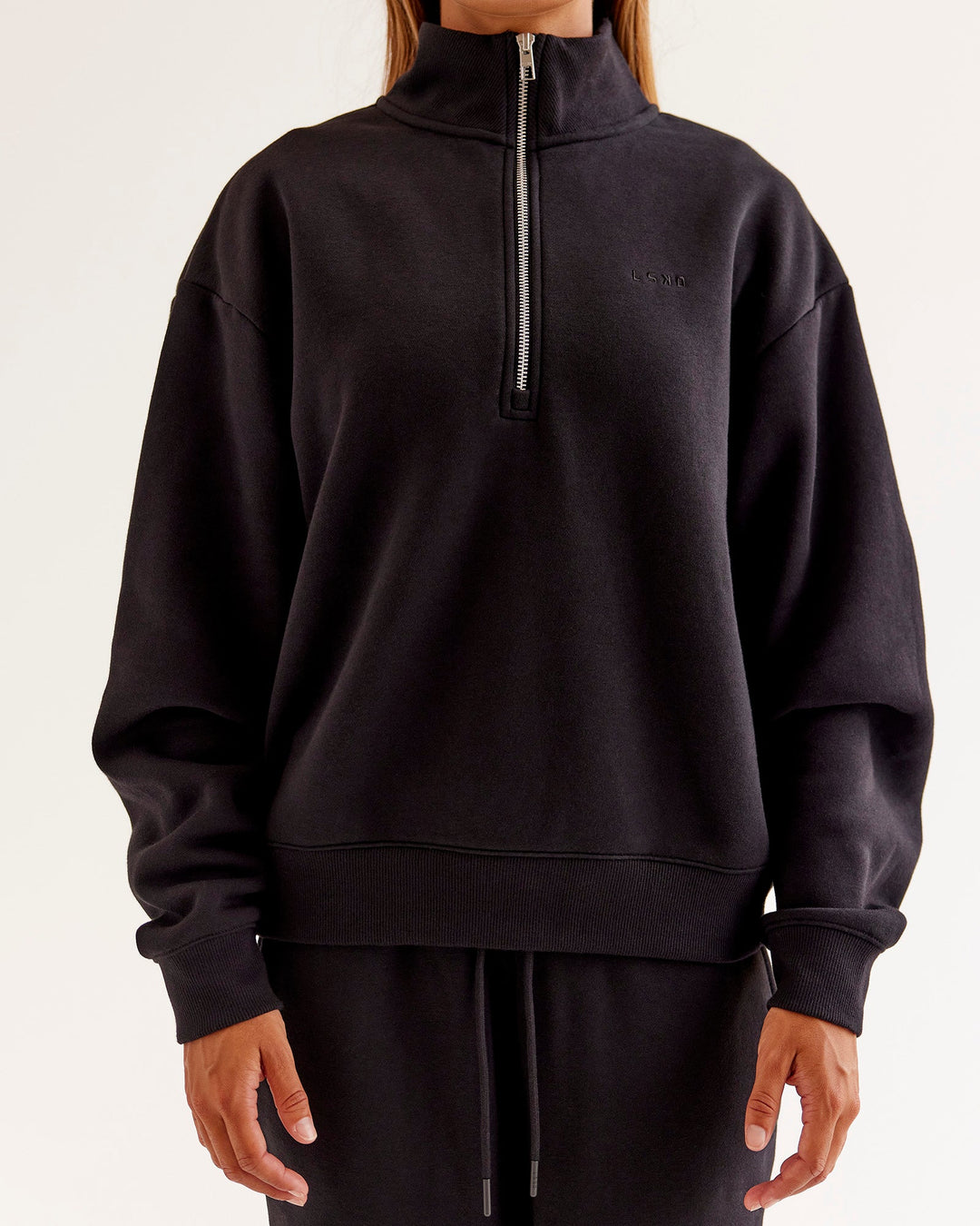 Woman wearing Go-To Oversized Quarter Zip Sweater - Black | Model:Jaimee | Size:XS - view 3
