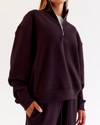 Woman wearing Go-To Oversized Quarter Zip Sweater - Midnight Plum | Model:Jaimee | Size:XS