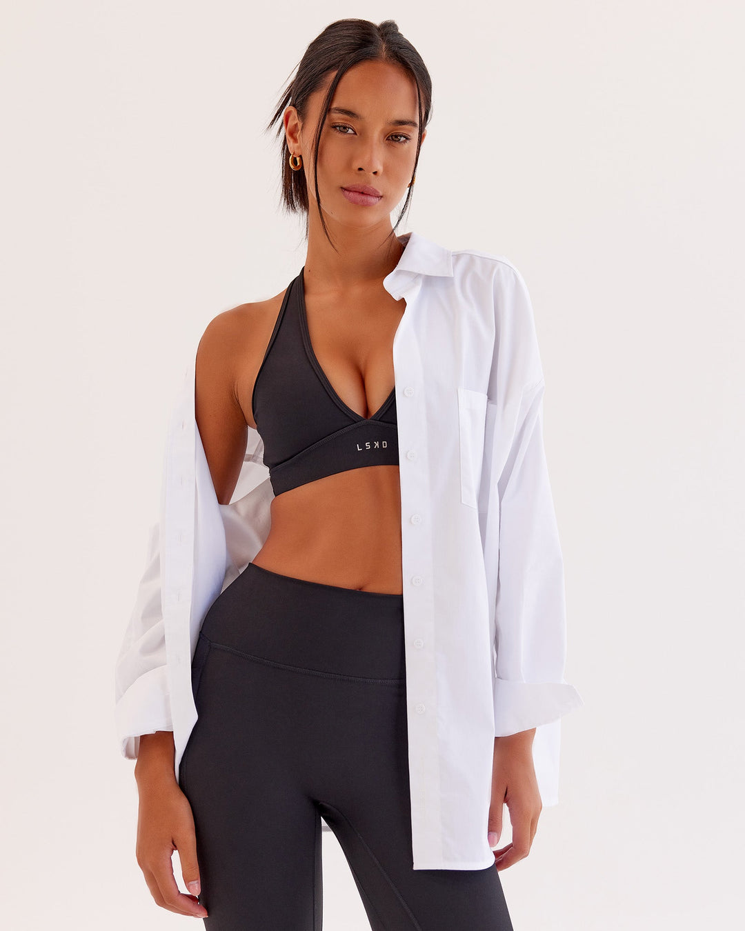 Woman wearing Go-To Oversized Shirt - White | Model:Tali | Size:XS - view 1