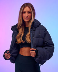 Woman wearing Go-To Puffer Jacket - Future Navy | Model:Georgia | Size:XS