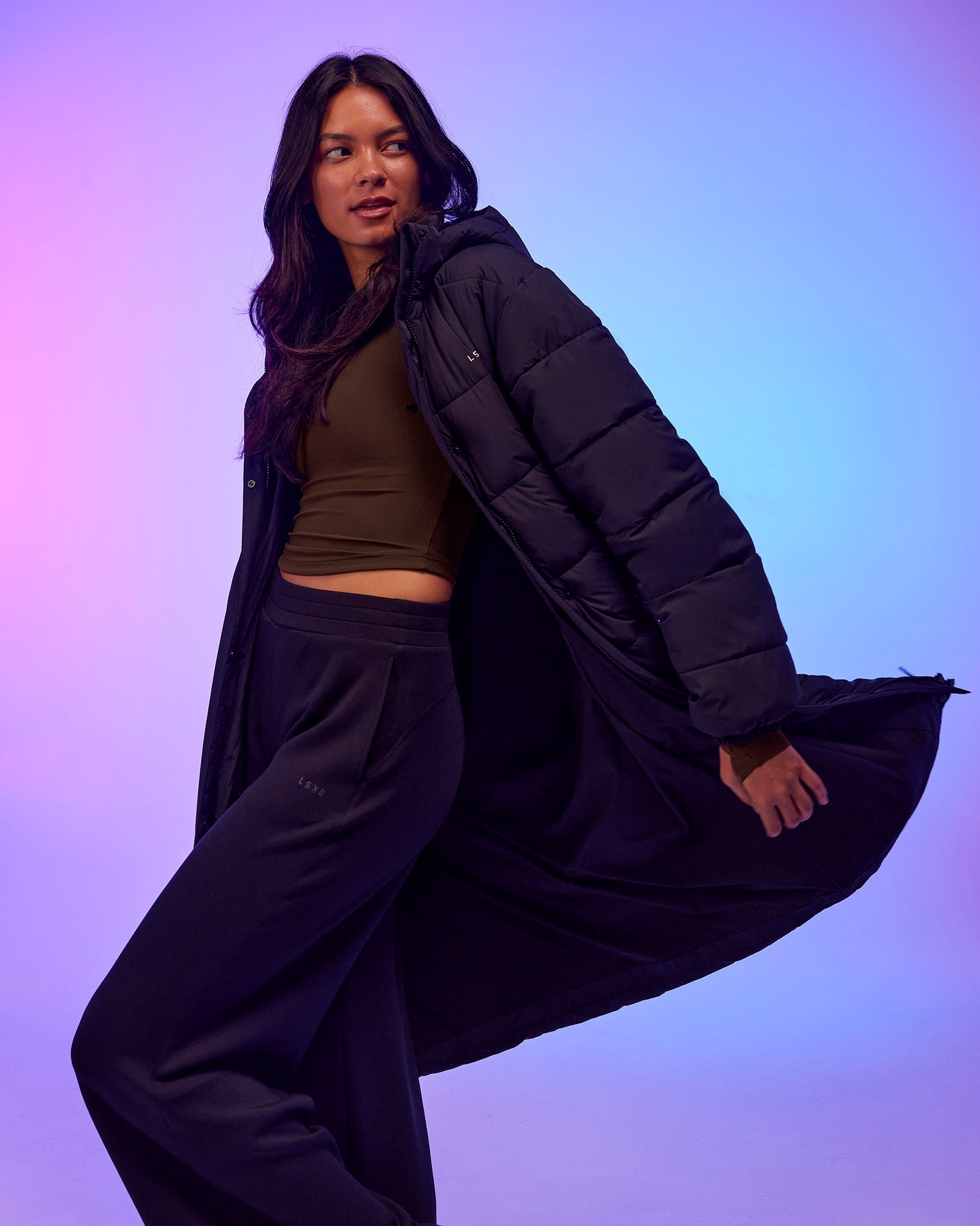 Woman wearing Go-To Puffer Long Jacket - Black | Model:Alex | Size:XS