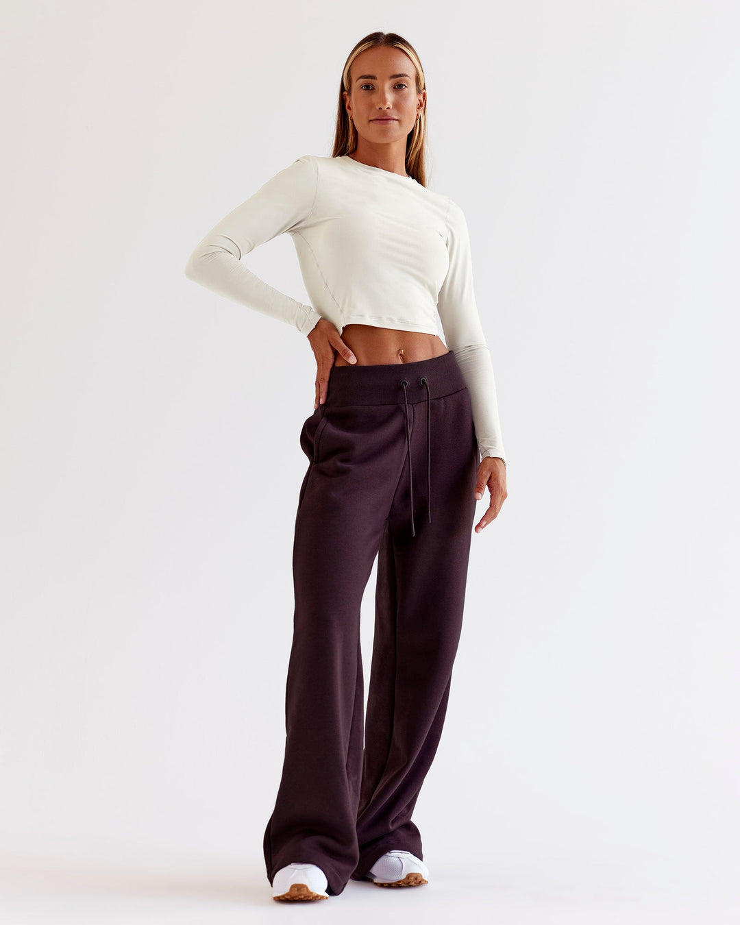 Woman wearing Go-To Wide Leg Track Pant - Midnight Plum | Model:Jaimee | Size:XS