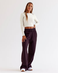 Woman wearing Go-To Wide Leg Track Pant - Midnight Plum | Model:Jaimee | Size:XS