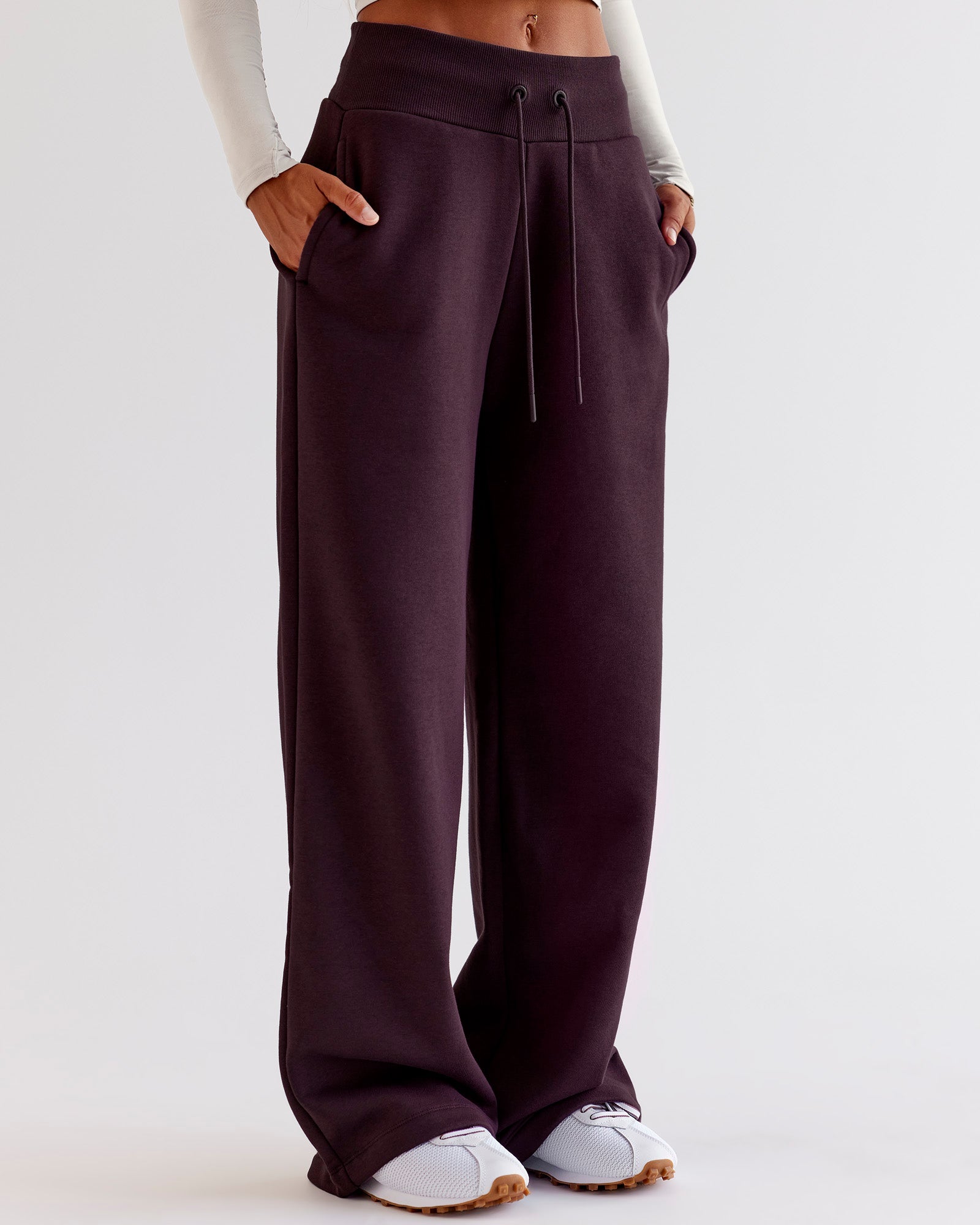 Woman wearing Go-To Wide Leg Track Pant - Midnight Plum | Model:Jaimee | Size:XS