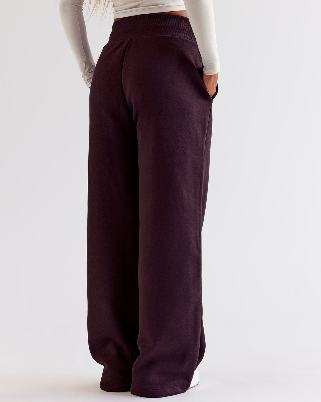 Woman wearing Go-To Wide Leg Track Pant - Midnight Plum | Model:Jaimee | Size:XS