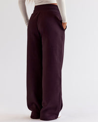Woman wearing Go-To Wide Leg Track Pant - Midnight Plum | Model:Jaimee | Size:XS