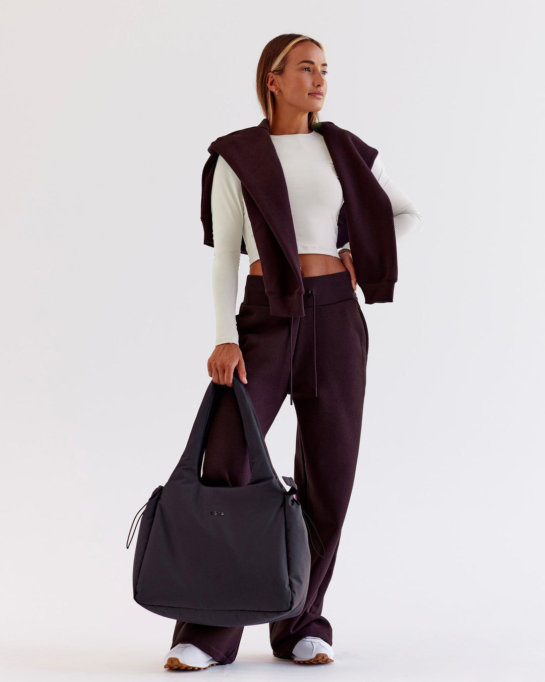 Woman wearing Go-To Wide Leg Track Pant - Midnight Plum | Model:Jaimee | Size:XS