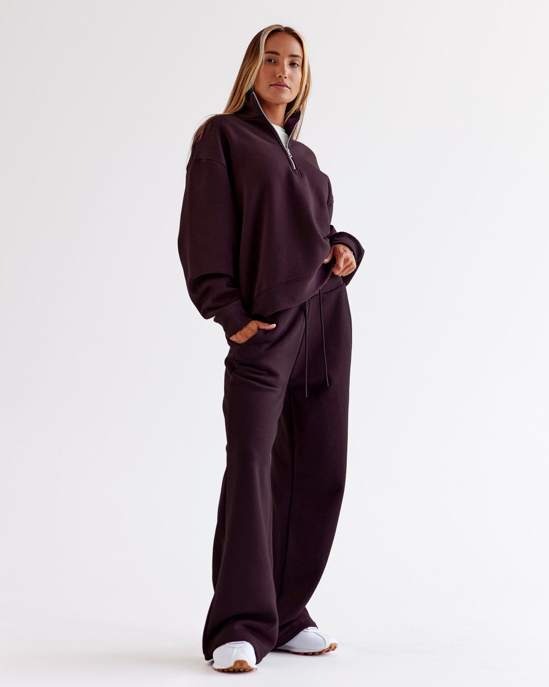 Woman wearing Go-To Wide Leg Track Pant - Midnight Plum | Model:Jaimee | Size:XS