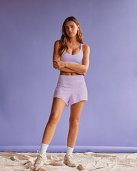 Woman wearing Movement CloudFLX 3" Short - Orchid Bloom Marl | Model:Beatriz | Size:XS