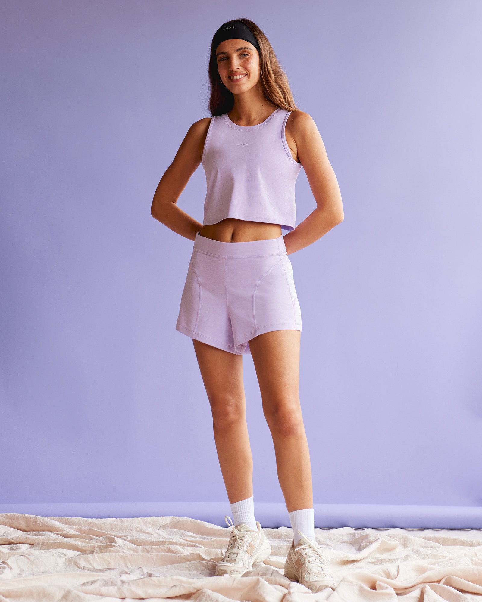 Woman wearing Movement CloudFLX 3" Short - Orchid Bloom Marl | Model:Beatriz | Size:XS
