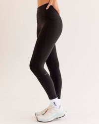 Woman wearing O.G Fusion Ultra High-Rise Full Length Legging Pockets - Black | Model:Taneisha | Size:XS