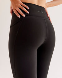 Woman wearing O.G Fusion Ultra High-Rise Full Length Legging Pockets - Black | Model:Taneisha | Size:XS