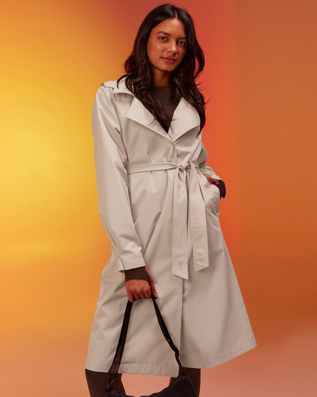 Woman wearing On the Move Trench Coat - Shale Beige | Model:Alex | Size:XS