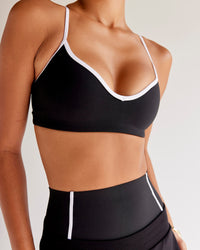 Woman wearing Power Sweetheart Sports Bra - Black | Model:Tali | Size:XS