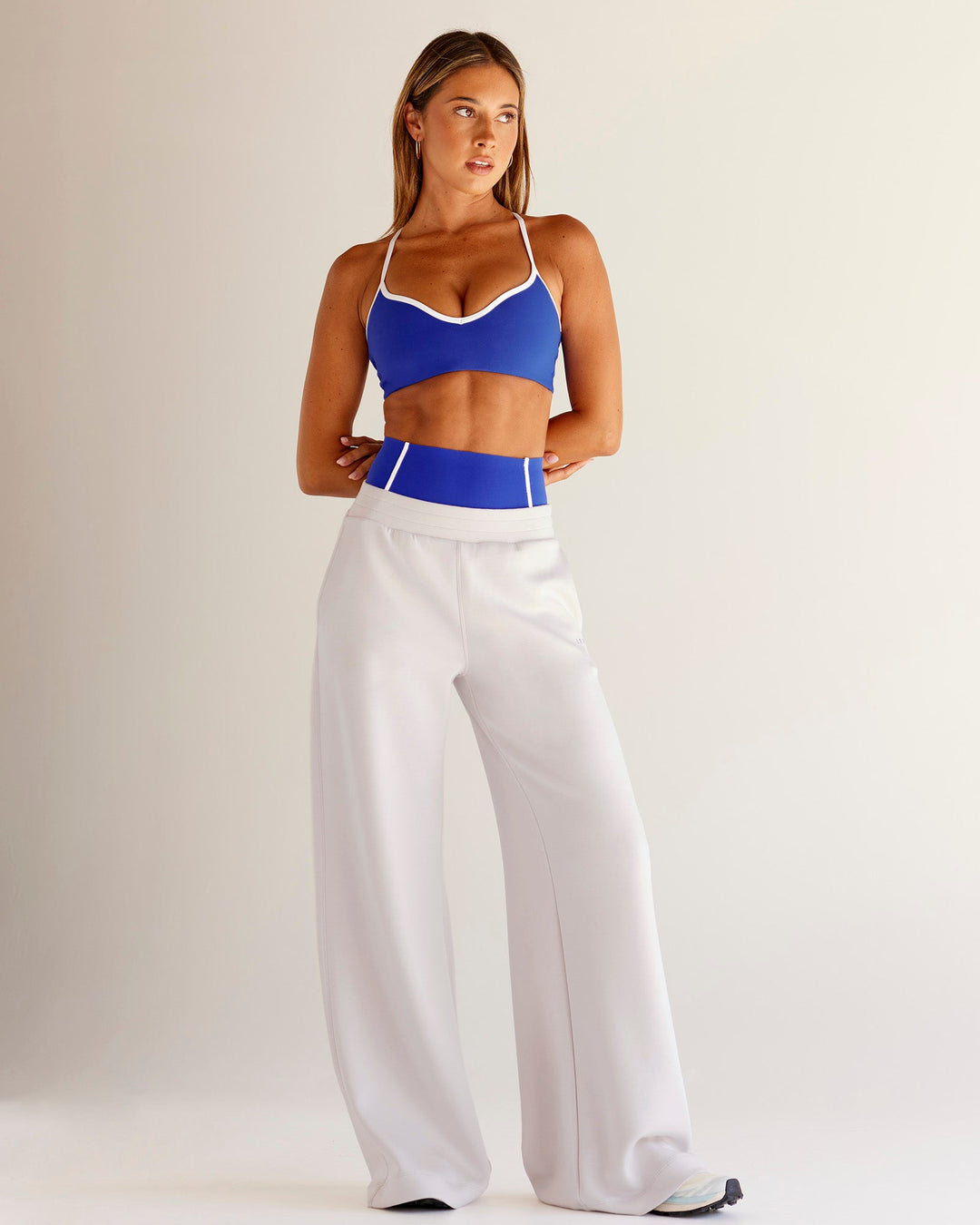 Woman wearing Power Sweetheart Sports Bra - Electric Indigo | Model:Charli | Size:XS