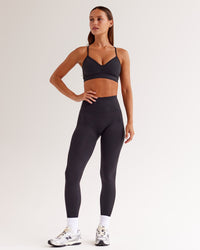 Woman wearing Spark Seamless Sports Bra - Black | Model:Brylee | Size:XS