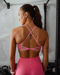 Woman wearing Stellar Sports Bra - Hot Pink | Model:Steph | Size:XS