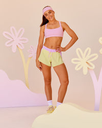 Woman wearing Velocity Sports Bra - Marshmallow | Model:Grace | Size:XS