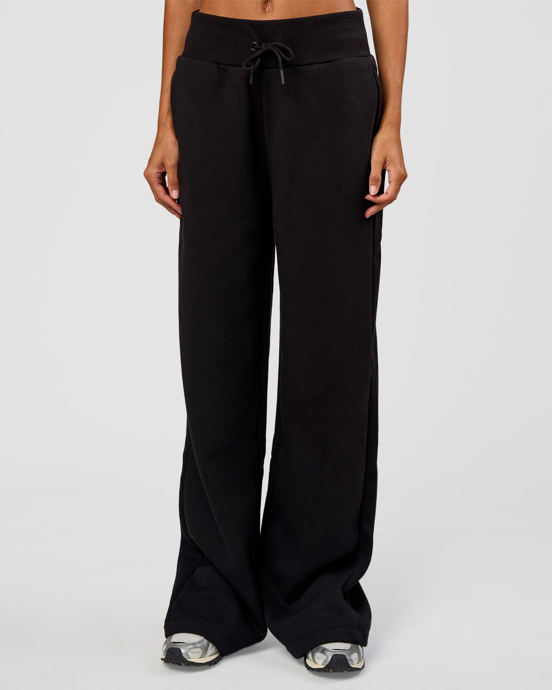 Woman wearing Go-To Wide Leg Track Pant Tall - Black | Model:Georgia | Size:XS - view 1