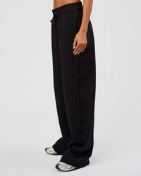 Woman wearing Go-To Wide Leg Track Pant Tall - Black | Model:Georgia | Size:XS
