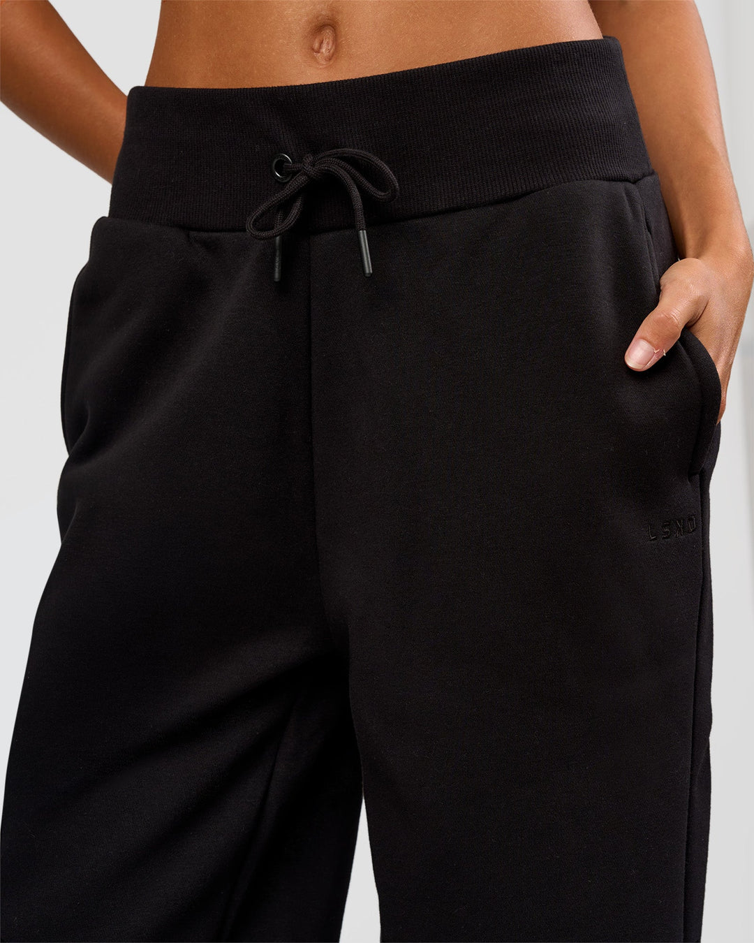 Woman wearing Go-To Wide Leg Track Pant Tall - Black | Model:Georgia | Size:XS - view 4