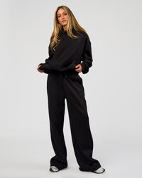 Woman wearing Go-To Wide Leg Track Pant Tall - Black | Model:Georgia | Size:XS | Thumbnail Index: 2