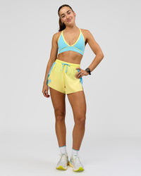 Woman wearing Breeze Sports Bra - Baltic Sea-Lemon | Model:Grace | Size:XS | Thumbnail Index: 5