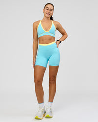 Woman wearing Breeze Sports Bra - Baltic Sea-Lemon | Model:Grace | Size:XS | Thumbnail Index: 11