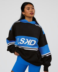 Woman wearing A-Team Oversized Hoodie - Caviar-Palace Blue | Model:Loren | Size:XS