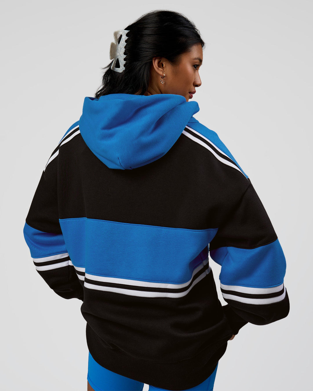 Woman wearing A-Team Oversized Hoodie - Caviar-Palace Blue | Model:Loren | Size:XS