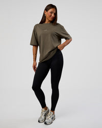 Woman wearing Abstract Haze FLXCotton Tee - Walnut Grey-White | Model:Bianca | Size:XS