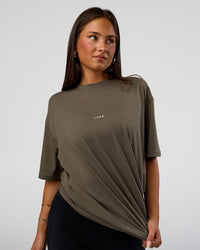 Woman wearing Abstract Haze FLXCotton Tee - Walnut Grey-White | Model:Bianca | Size:XS