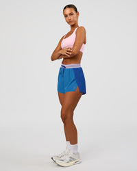 Woman wearing Accelerate 3" High-Rise Running Short - Electric Indigo-Multi | Model:Brylee | Size:XS