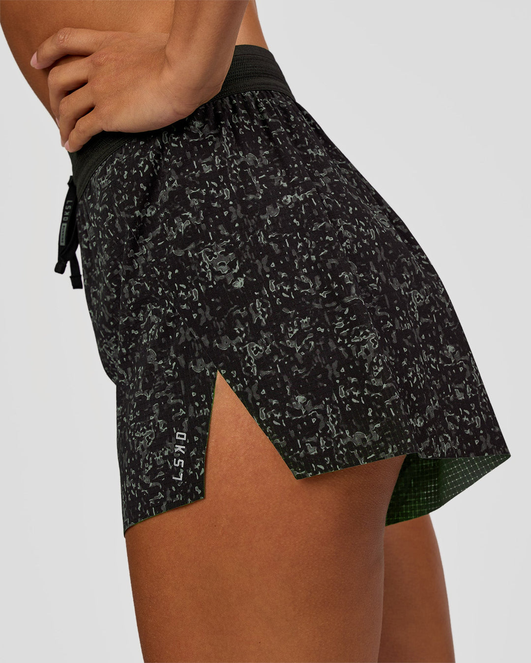 Woman wearing Accelerate 3" High-Rise Running Short - Energy Print Black | Model:Brylee | Size:XS - view 3