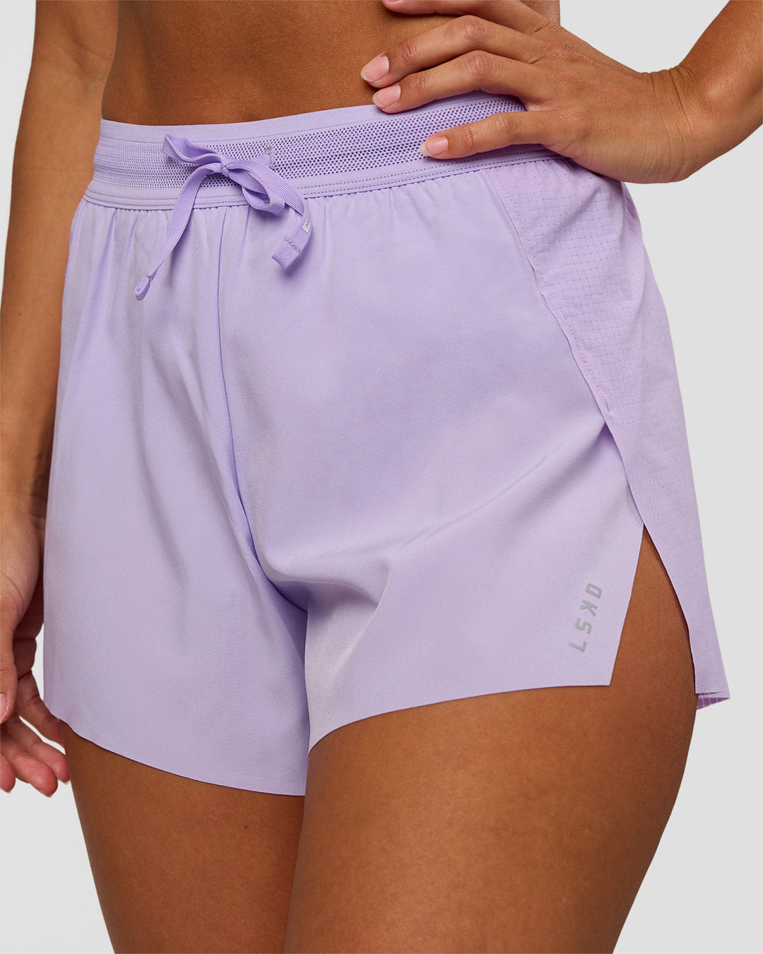 Woman wearing Accelerate 3" High-Rise Running Short - Pale Lilac | Set:true | Angle:closeup | Model:Brylee | Size:XS