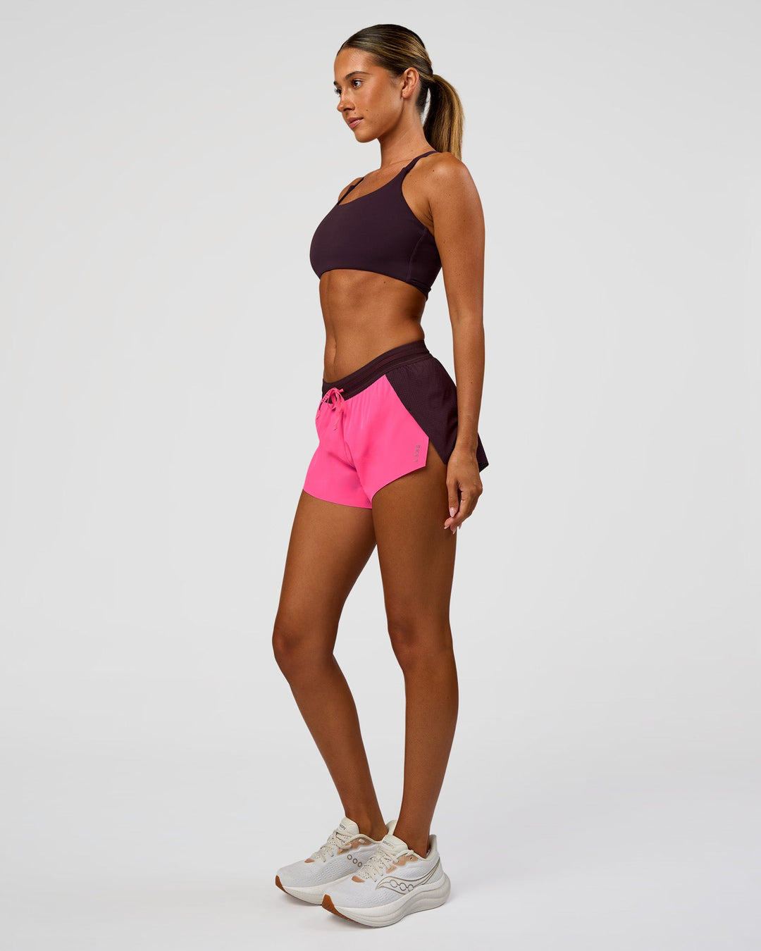 Woman wearing Accelerate 3" Mid-Rise Running Short - Midnight Plum-Sugar Plum| Model:Charli | Size:XS - view 7