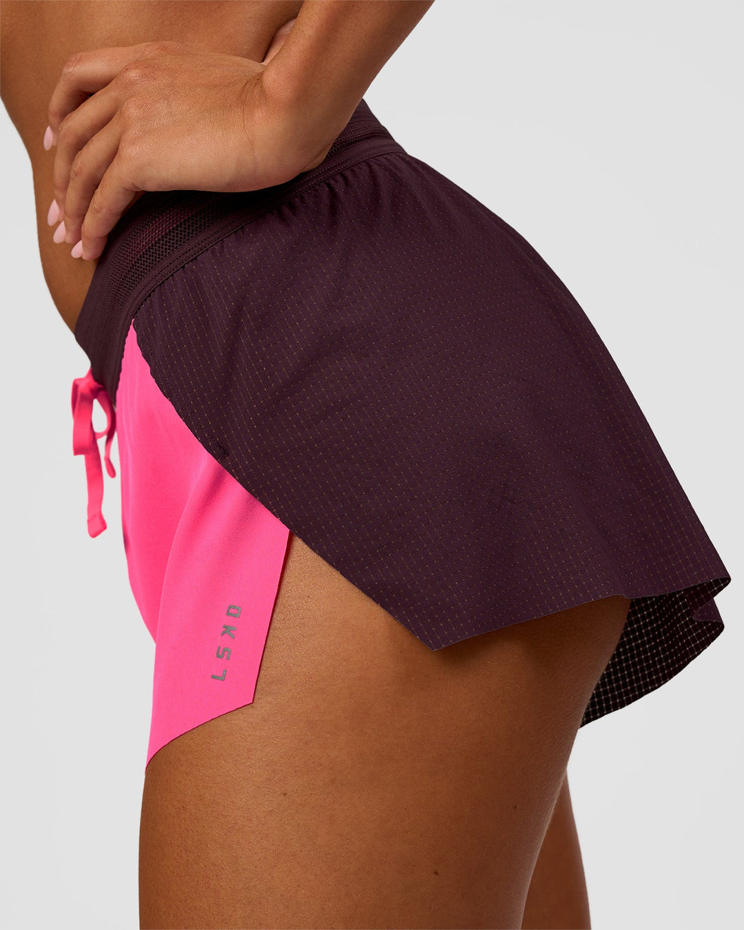 Woman wearing Accelerate 3" Mid-Rise Running Short - Midnight Plum-Sugar Plum | Model:Charli | Size:XS - view 5