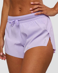 Woman wearing Accelerate 3" Mid-Rise Running Short - Pale Lilac | Set:true | Angle:closeup | Model:Brylee | Size:XS