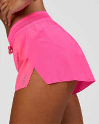 Woman wearing Accelerate 3" Mid-Rise Running Short - Sugar Plum | Set:true | Angle:closeup | Model:Brylee | Size:XS