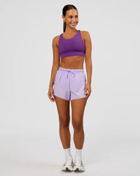 Woman wearing Accelerate Sports Bra - Fresh Purple | Model:Brylee | Size:XS